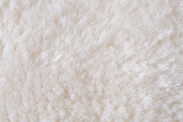 white plush fabric texture background , background pattern of soft warm material