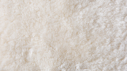 white plush fabric texture background , background pattern of soft warm material