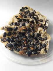 black soybean shreds on a white background