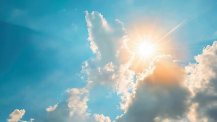 The sun beams brilliantly through soft, fluffy clouds, illuminating the clear blue sky on a sunny day