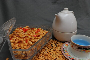 Nuts and spices chili and onion on black background for product, educational and other purposes