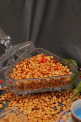 Nuts and spices chili and onion on black background for product, educational and other purposes