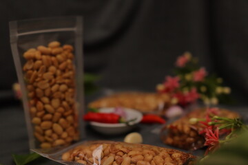 Nuts and spices chili and onion on black background for product, educational and other purposes