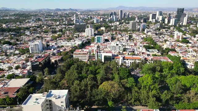 Lateral traveling with drone of Ruben Dario Park in Guadalajara, Mexico