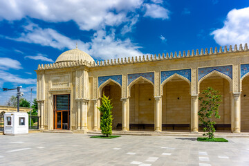 Obraz premium Exterior of the ruins of oldest mosque in Azerbaijan c.743 and renovated new mosque in Shemakhi (Shemakha) city as seen in August 2024.