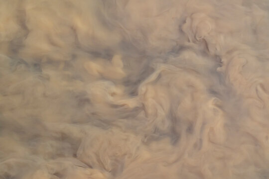 Brown water, dirty stream, abstract background, wallpaper.
