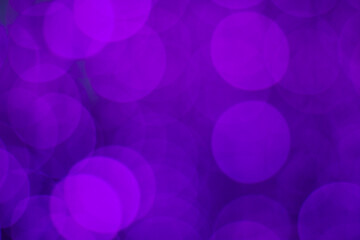 Colorful abstract blurred circular bokeh lights of small hanging lamps