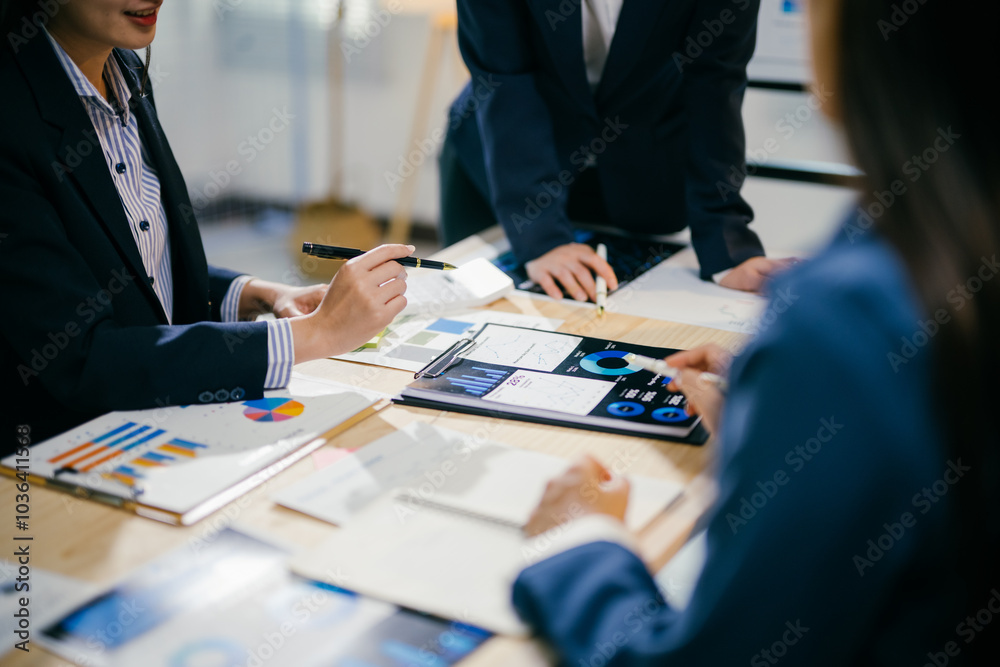 Poster Business people having a meeting, analyzing financial charts and graphs using digital tablet and document, brainstorming and discussing about new business project