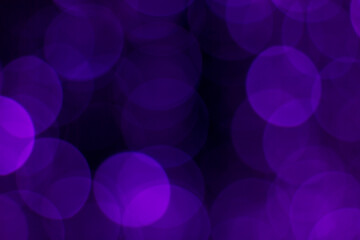 Colorful abstract blurred circular bokeh lights of small hanging lamps