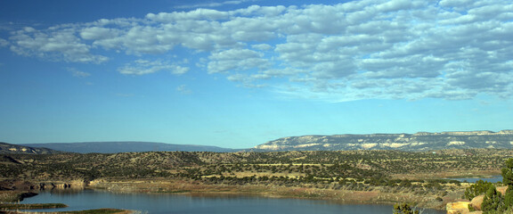 Ultra-wide panorama of Abiquiu Lake, an Army Corps of Engineers reservoir in northern New Mexico, at dawn