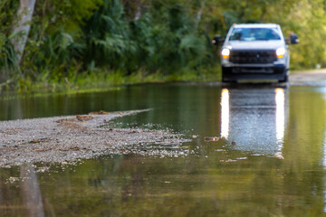 Truck on flooded road