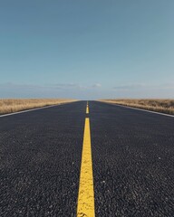 Empty Road Leading to Horizon Under Clear Sky