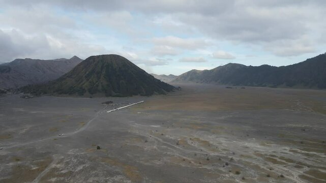 View of Mount Bromo and Mount Batok seen from a height. Bromo Tengger Semeru National Park is a very famous natural tourist area located in Probolinggo, East Java, Indonesia.