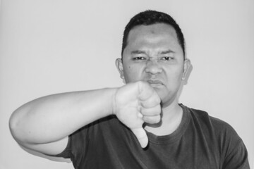 a man is giving thumbs down
