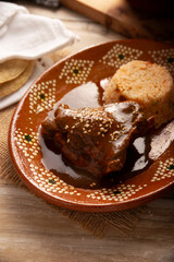 Mole Poblano. Chicken with Mole. Typical dish, emblematic of Mexican food made with a mixture of...