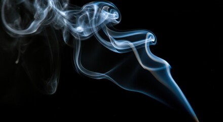 Fototapeta premium Abstract Smoke Pattern Against a Black Background