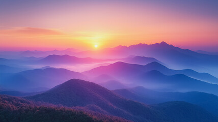 A beautiful mountain range with a pink and purple sunset in the background