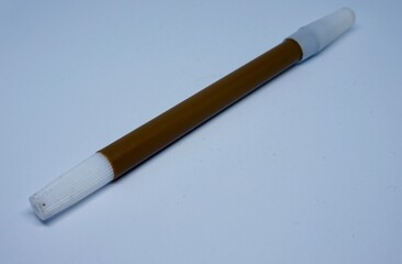 close up photo of brown colored pencil