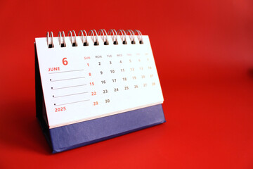 Monthly calendar template for the new year 2025 desk calendar,on red background