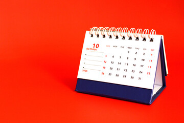 Monthly calendar template for the new year 2025 desk calendar,on red background