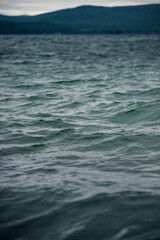 Textural waves at sunset in the sea
