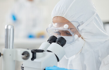 Microscope, ppe and woman scientist checking virus, test results or pharmaceutical innovation with...