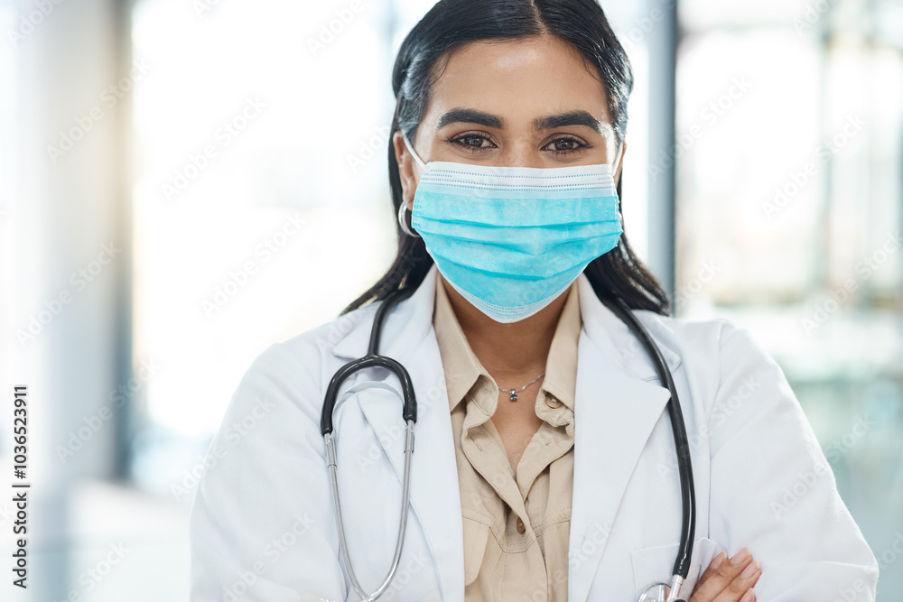 Wall mural Portrait, girl and doctor with face mask in hospital of healthcare services, ppe safety and medical compliance. Woman, surgeon and arms crossed for virus danger, wellness risk and about us of surgery