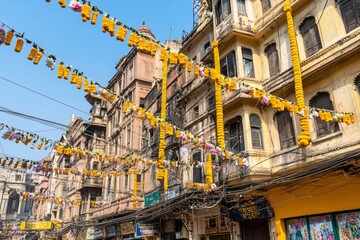 Streets Decorated with Yellow Garlands and Colorful Flowers