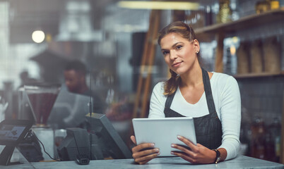 Tablet, woman and portrait of barista in coffee shop for online menu update or stock control. Serving industry, cafe and female waitress with digital technology for inventory report in restaurant.
