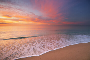 Sandy seashore at sunset