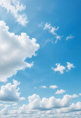 Bright blue sky with fluffy white clouds