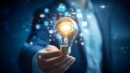 Businessman holding light bulb and brain network with icon business and technology, innovative in futuristic, network connection on interface background, abstract, innovation and technologies. 