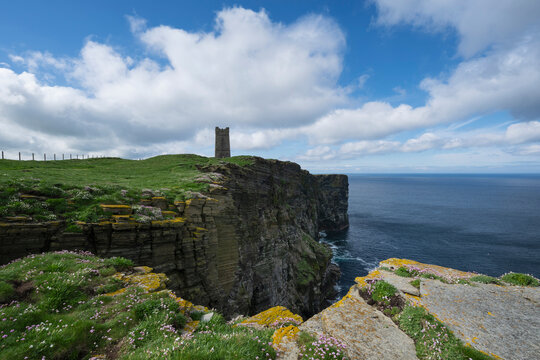 Kitchener memorail tower and cliffs of Marwick head, Orkney, Scoland