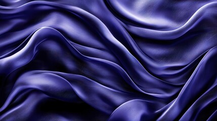 Obraz premium Elegant flowing silk fabric in deep blue hues, showcasing smooth textures and dramatic folds.