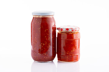 Traditional homemade canned tomatoes. Canned tomatoes prepared for winter meals