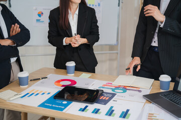 Strategic Business Meeting: Professionals Collaborate on Data-Driven Decisions 