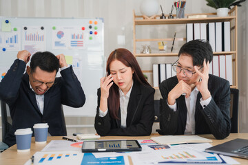 The Weight of Expectations: A team of business professionals grapples with a difficult situation, their expressions reflecting the pressure and stress of their work.