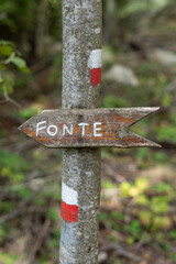 Sign in the woods in Finale Ligure, Italy