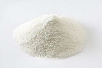 Heap of baking powder isolated on white