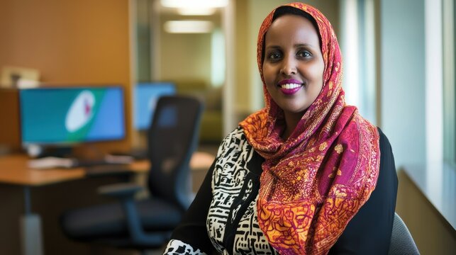 Professional Somali Woman in Modern Office Setting, Dressed in Traditional Hijab, Ideal for Cultural and Business Contexts