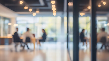 Business open modern office daytime daylight with blurred people in smart casual wear having a meeting. Working culture chill happy enjoy workplace work life balance plant green interior sustainable