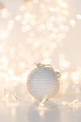 Golden Christmas lights defocused in bokeh effect. Copy space. Can be used as wallpaper. Can be used for New year's celebration.