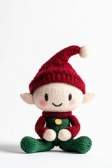 Adorable knitted elf doll with a festive hat