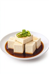 Fresh tofu with green onions in soy sauce glaze