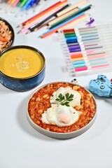 Mediterranean dishes with poached eggs