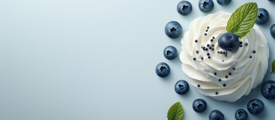 Whipped cream blueberries dessert swirl topping mint sweet pastry gourmet baking food styling background elegant texture white soft cooking class confectionery recipe minimal modern concept