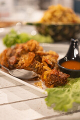 Soft shell crab fried with garlic. Close up
