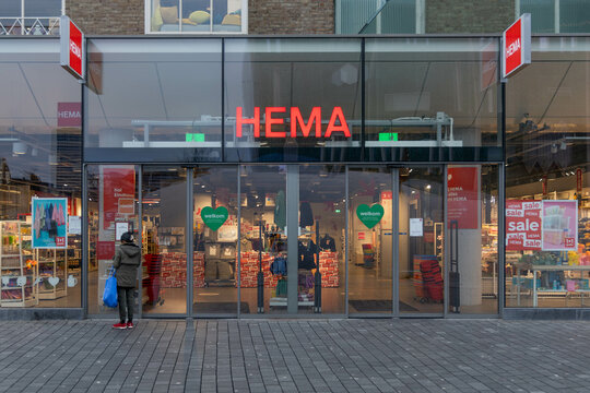 Hema logo above the store entrance, a discount retail chain shop in the streets of central Eindhoven. Eindhoven, the Netherlands. 7 January 2024. 