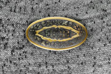 Vintage brooch on fabric