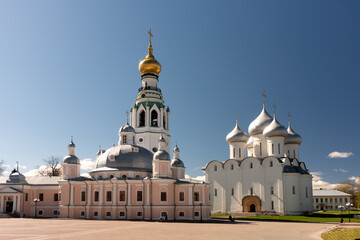 Fototapeta premium View of the Vologda Kremlin. St. Sophia Cathedral, bell tower and Resurrection Cathedral on a clear summer day. Historical landmark of the city of Vologda.